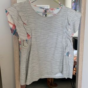 Grey and white striped blouse with ruffled sleeves